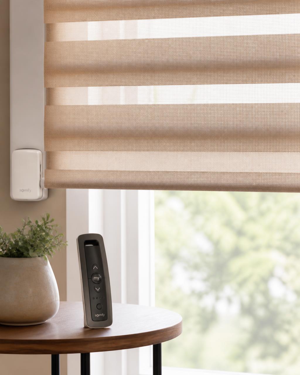 Motorized blinds in a Coimbatore living room operated by remote