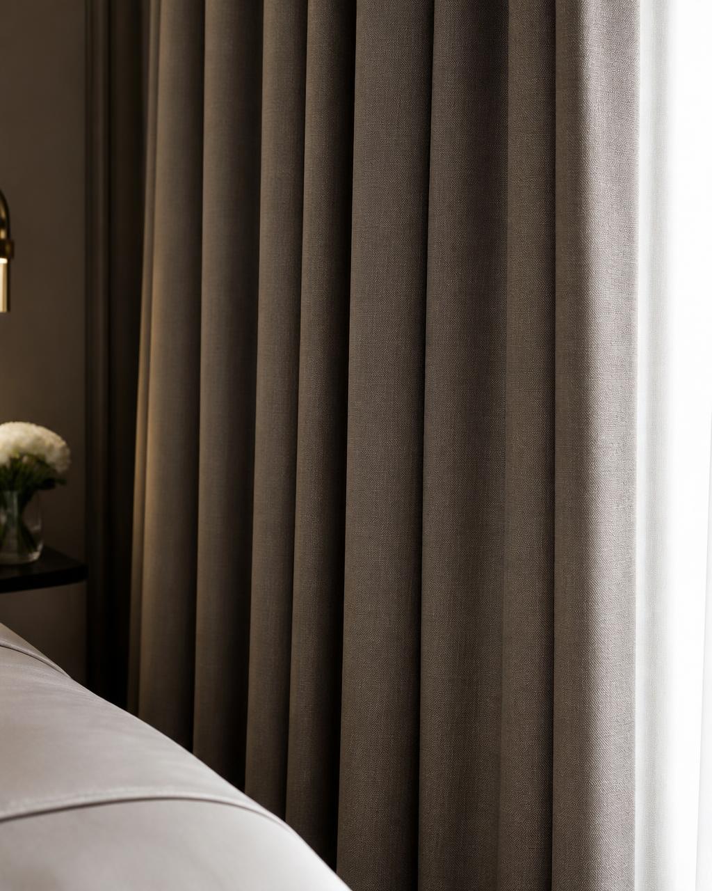 Motorised blackout curtains in a Coimbatore bedroom on a concealed track