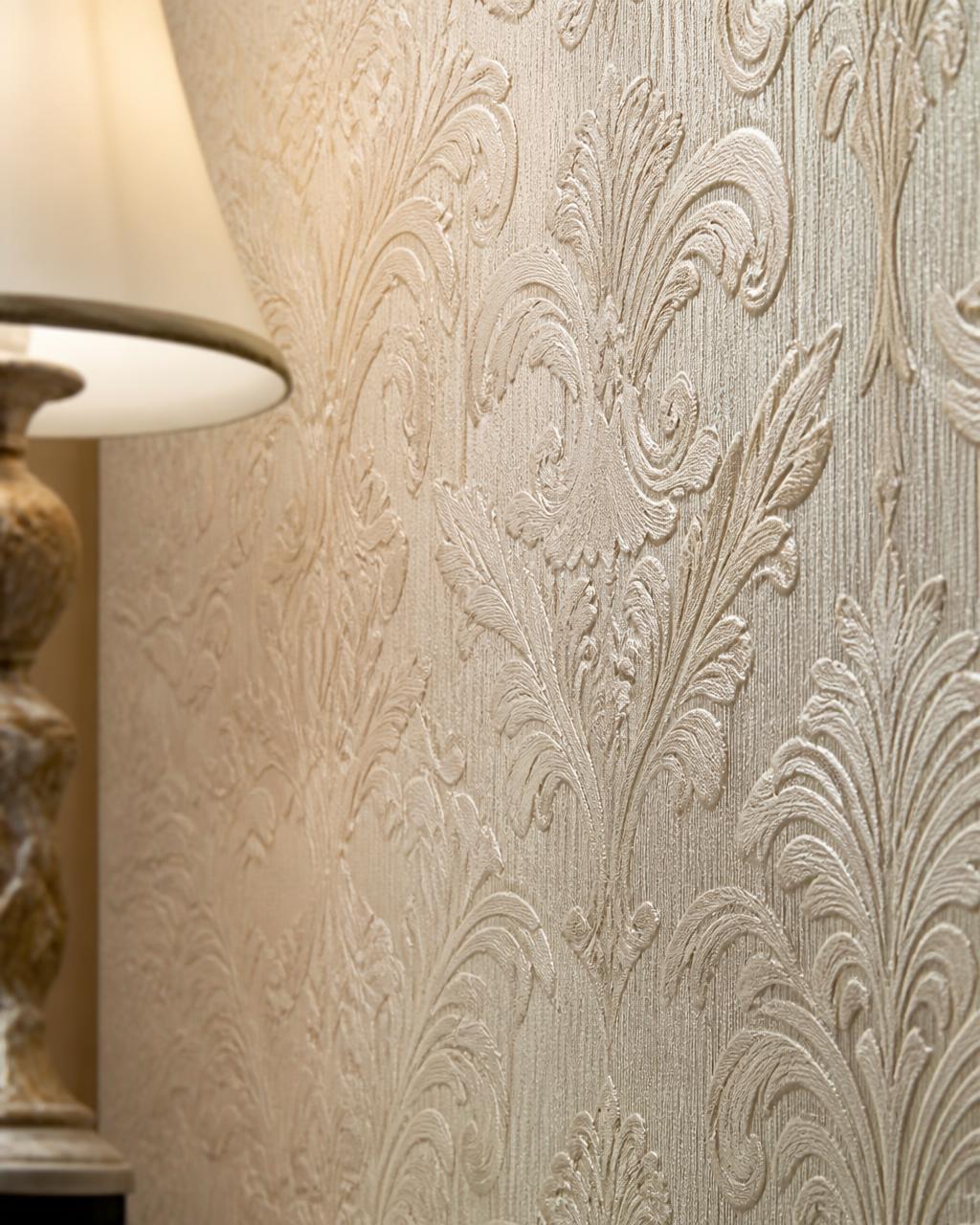 Textured plain wallpaper on a living room feature wall in a Coimbatore home
